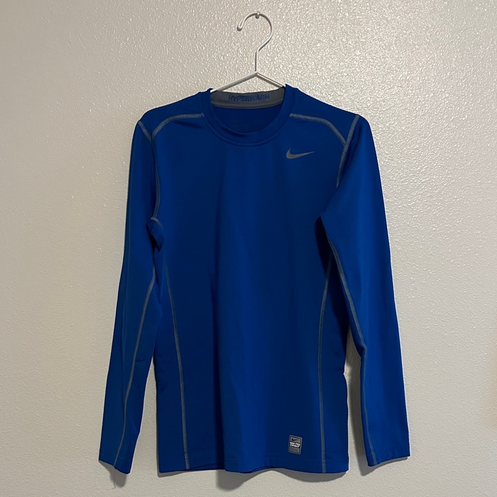 Nike Men's Blue Long Sleeve Dri-Fit Hyperwarm Compression shirt.